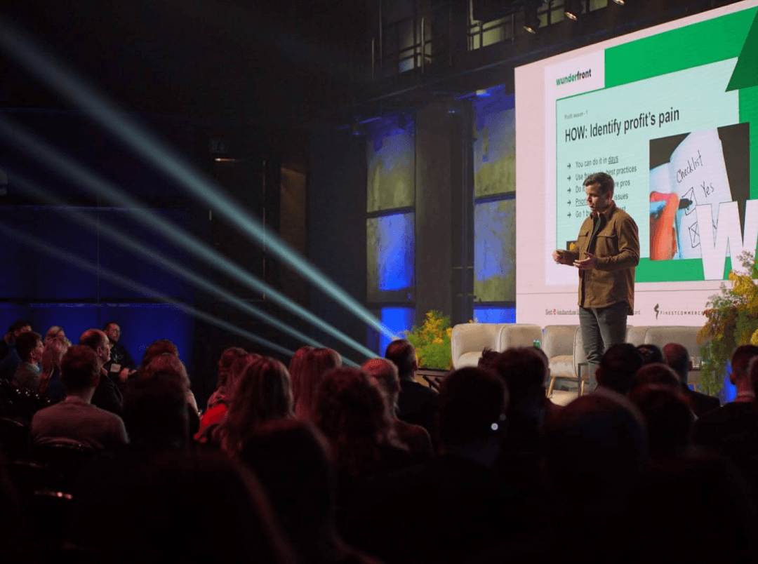 Lauri Post speaking to a live audience.